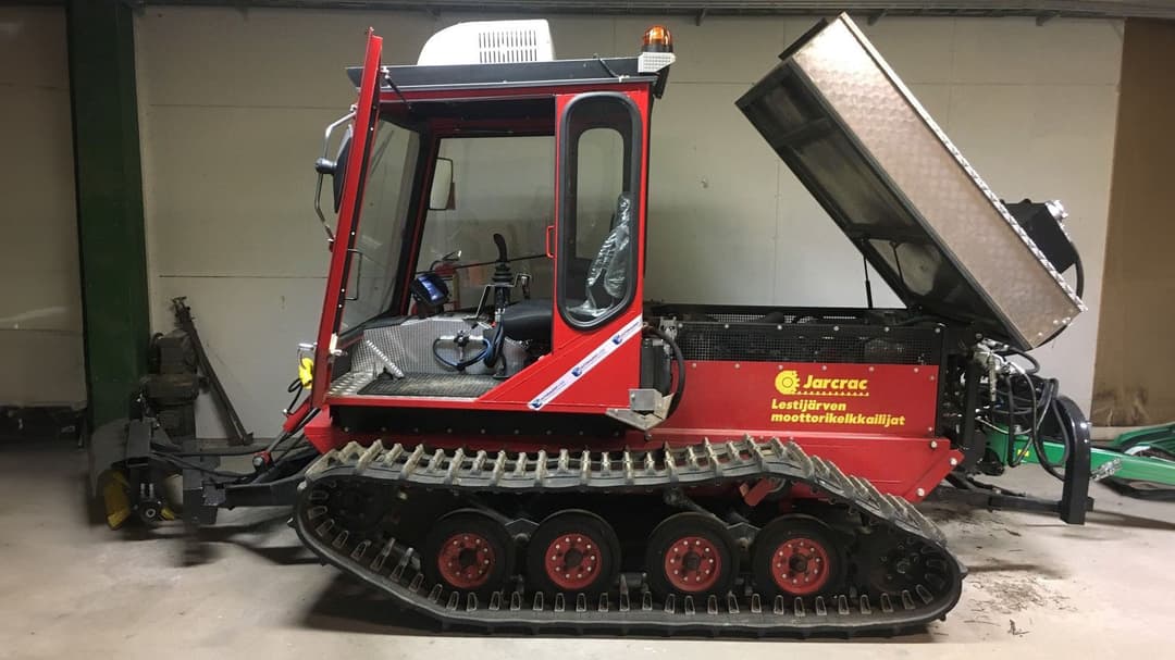  A red snow machine.