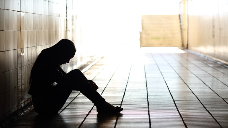 7070714-teenager-depressed-sitting-inside-a-dirty-tunnel.jpg