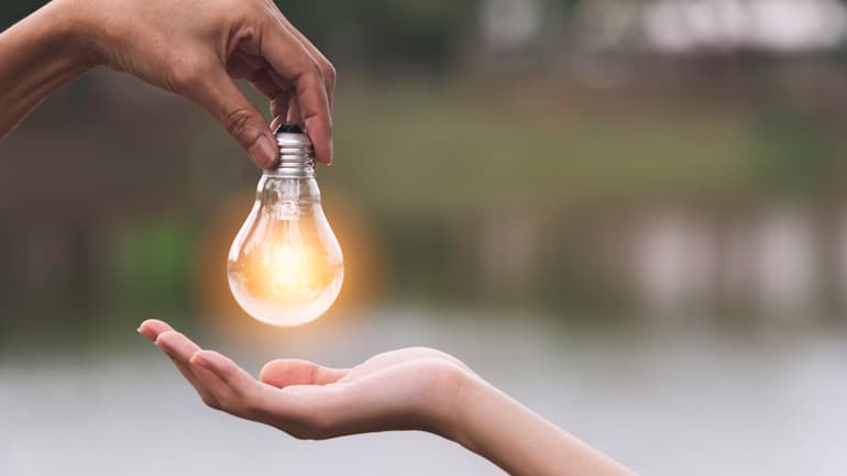 31725172-innovation-or-creative-concept-of-hand-hold-a-light-bulb.jpg