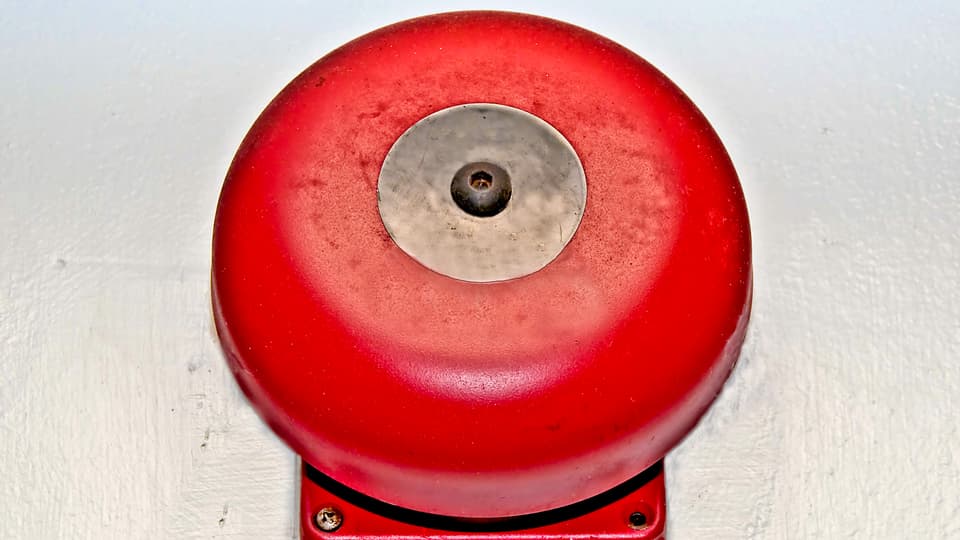 3590416-the-fire-alarm-embedded-in-the-wall-background.jpg