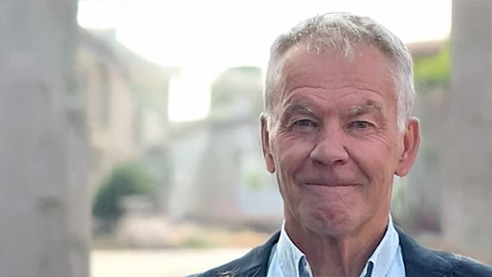 Porträtt av äldre man